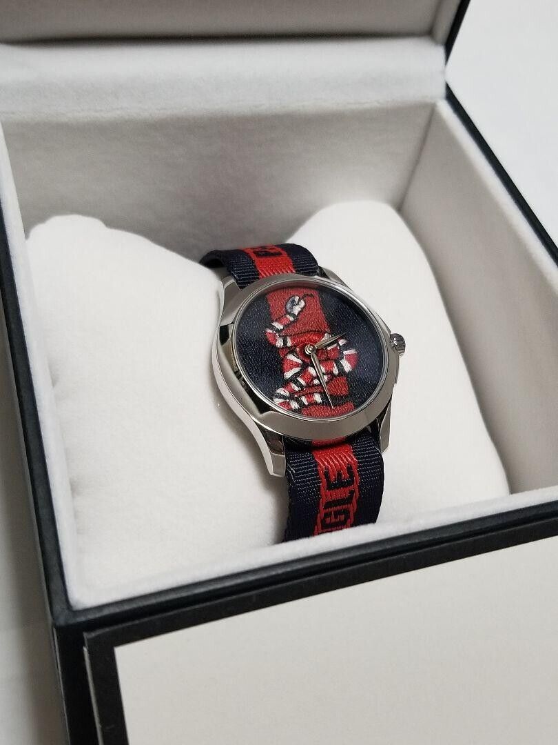  Shop Authentic Gucci Le Marche Des Merveilles Blue Red Dial Blue Red Nylon Strap Unisex Watch - YA126493 - Luxxuri