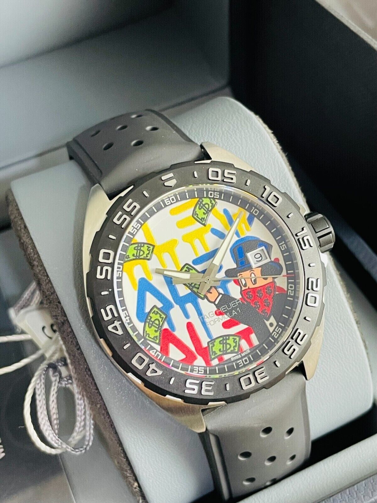  Shop Authentic Tag Heuer Formula 1 Alec Monopoly White Dial Watch for Men - WAZ1119.FT8023 - Luxxuri
