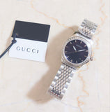  Shop Authentic Gucci G Timeless Diamonds Mother of Pearl Black Dial Silver Mesh Bracelet Watch For Women - YA126507 - Luxxuri