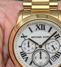  Shop Authentic Michael Kors Cooper Chronograph White Dial Gold Steel Strap Watch For Women - MK5916 - Luxxuri