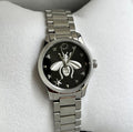  Shop Authentic Gucci G Timeless Quartz Diamonds Black Dial Silver Steel Strap Watch For Women - YA1265024 - Luxxuri