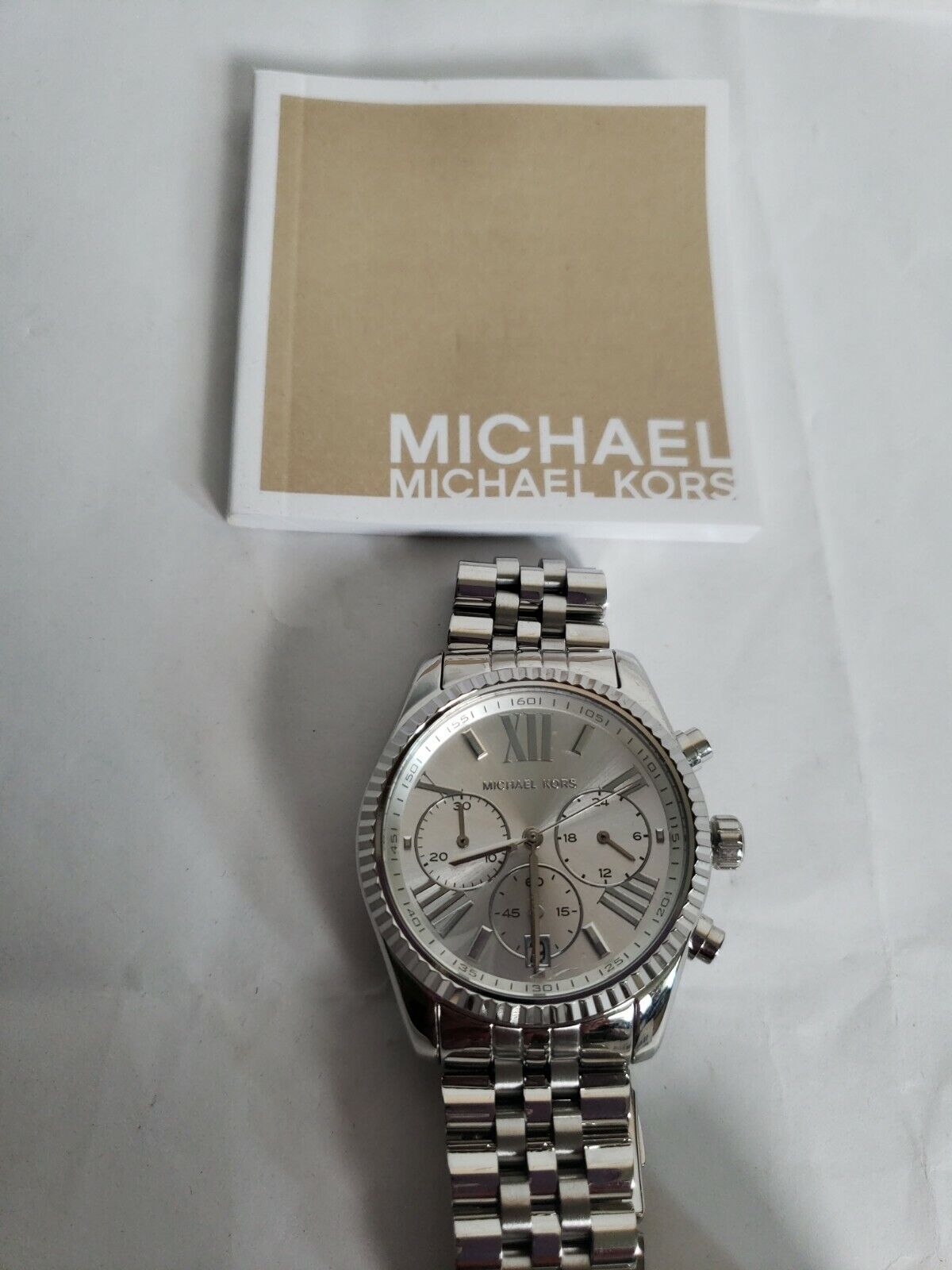  Shop Authentic Michael Kors Lexington Silver Dial Silver Steel Strap Watch for Women - MK5555 - Luxxuri