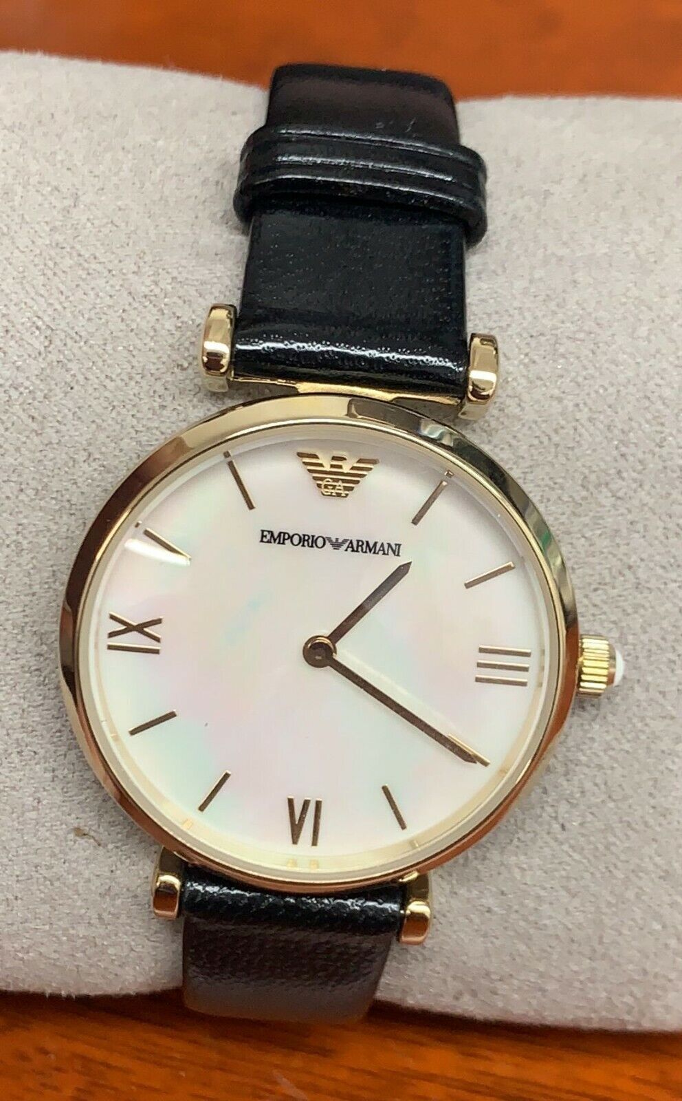  Shop Authentic Emporio Armani Gianni T-Bar Quartz Mother of Pearl Dial Black Leather Strap Watch For Women - AR1910 - Luxxuri