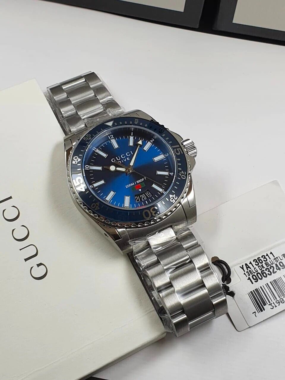  Shop Authentic Gucci Dive Quartz Blue Dial Silver Steel Strap Watch For Men - YA136311 - Luxxuri