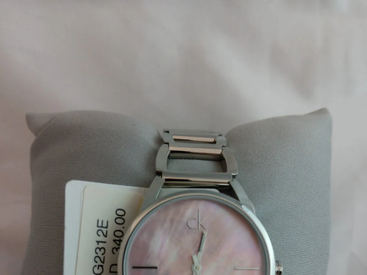  Shop Authentic Calvin Klein Stately Pink Mother of Pearl Dial Silver Steel Strap Watch for Women - K3G2312E - Luxxuri