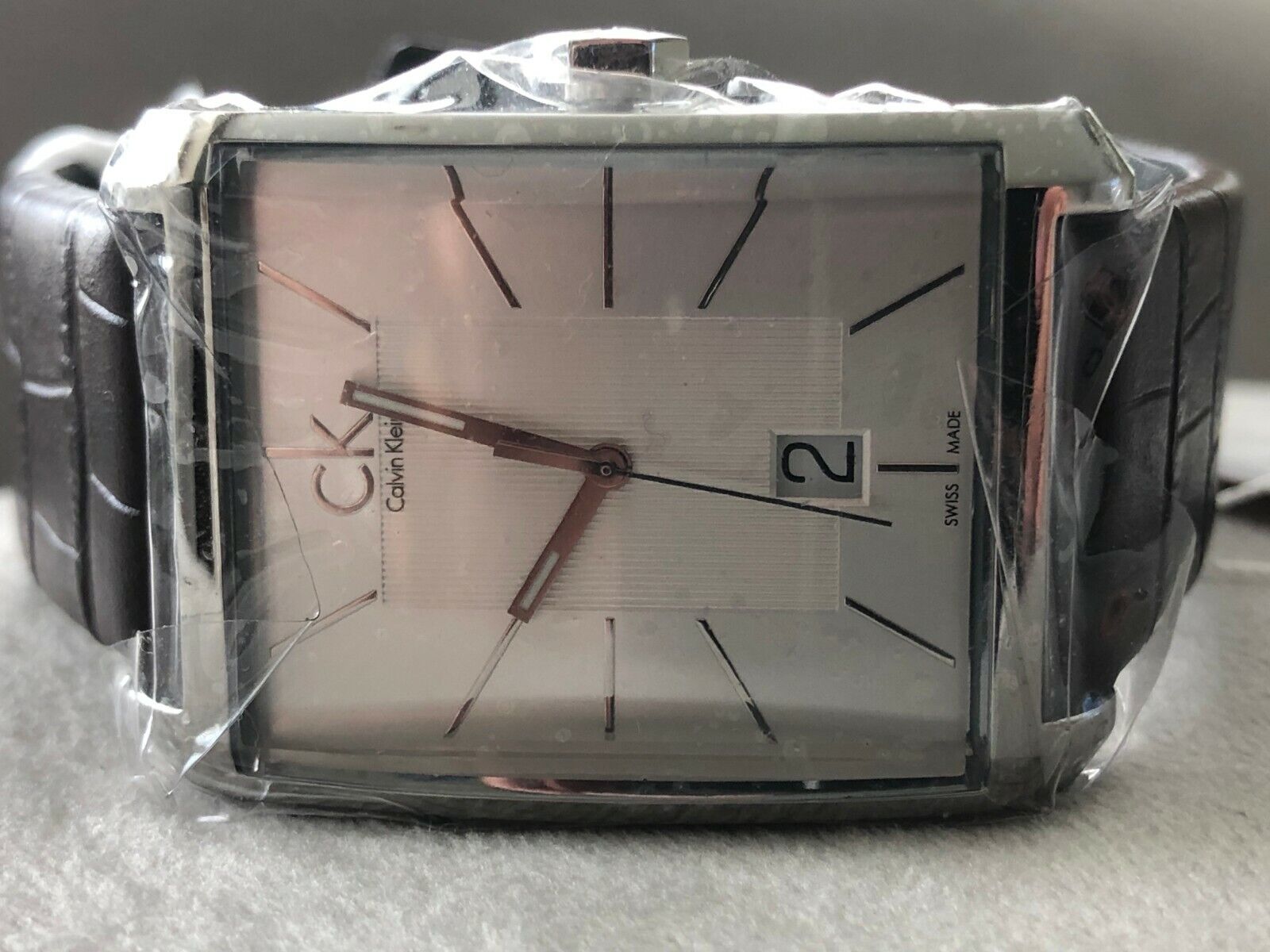  Shop Authentic Calvin Klein Window Silver Dial Brown Leather Strap Watch for Men - K2M21126 - Luxxuri