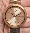  Shop Authentic Michael Kors Garner Quartz Rose Gold Dial Rose Gold Steel Strap Watch For Women - MK6409 - Luxxuri