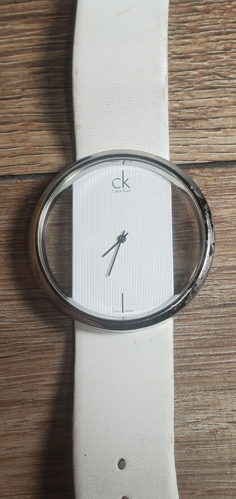  Shop Authentic Calvin Klein Glam Transparent Dial White Leather Strap Watch for Women - K9423101 - Luxxuri