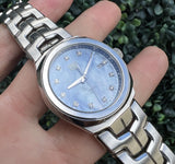  Shop Authentic Tag Heuer Link Quartz Diamonds Blue Mother of Pearl Dial Silver Steel Strap Watch for Women - WBC1313.BA0600 - Luxxuri