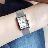  Shop Authentic Guess Nouveau Diamonds Silver Dial Silver Mesh Bracelet Watch for Women - W0127L1 - Luxxuri
