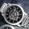  Shop Authentic Emporio Armani Meccanico Automatic Skeleton Black Dial Silver Steel Strap Watch For Men - AR60021 - Luxxuri