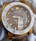  Shop Authentic Gucci Dive Doraemon Brown Dial Brown Leather Strap Watch For Men - YA136334 - Luxxuri