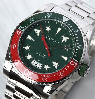  Shop Authentic Gucci Dive Quartz Green Dial Silver Steel Strap Watch For Men - YA136222 - Luxxuri