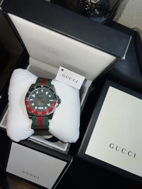  Shop Authentic Gucci Dive Quartz Green Dial Two Tone NATO Strap Watch For Men - YA136339 - Luxxuri