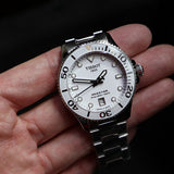  Shop Authentic Tissot Seastar 1000 Lady White Dial Silver Steel Strap Unisex Watch - T120.210.11.011.00 - Luxxuri