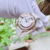 Shop Authentic Swarovski Crystalline Aura Silver Dial White Leather Strap Watch for Women - 5519453 - Luxxuri