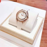  Shop Authentic Swarovski Crystalline Aura Silver Dial White Leather Strap Watch for Women - 5519453 - Luxxuri