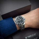  Shop Authentic Tag Heuer Aquaracer Caliber 5 Automatic Black Dial Silver Steel Strap Watch for Men - WAK2110.BA0830 - Luxxuri