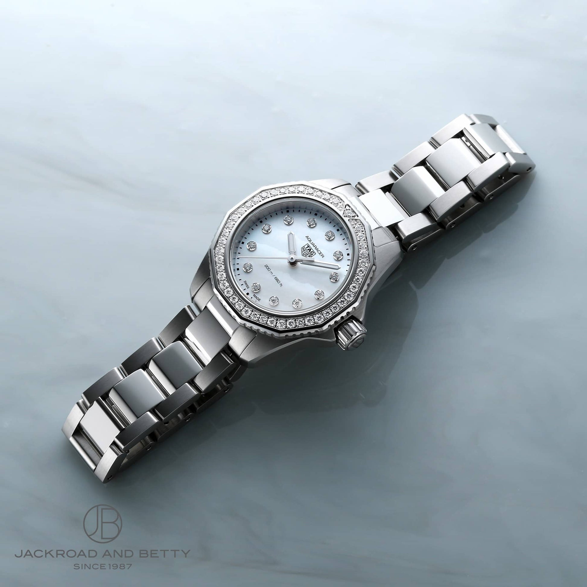  Shop Authentic Tag Heuer Aquaracer Professional 200 Quartz Diamond Mother of Pearl Dial Silver Steel Strap Watch for Women - WBP1417.BA0622 - Luxxuri