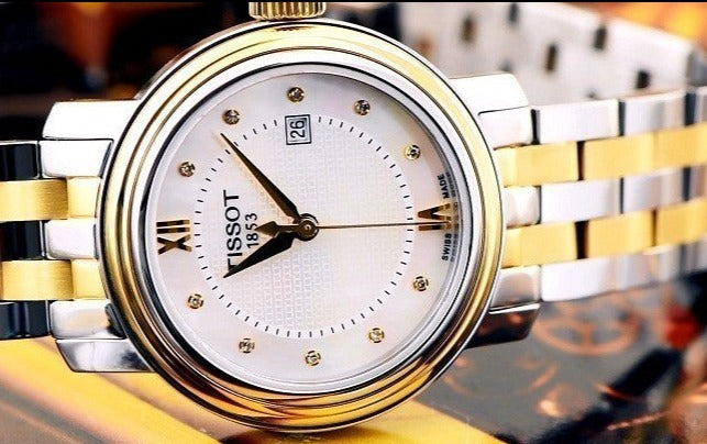  Shop Authentic Tissot T Classic Bridgeport Mother of Pearl Dial Two Tone Steel Strap Watch For Women - T097.010.22.116.00 - Luxxuri