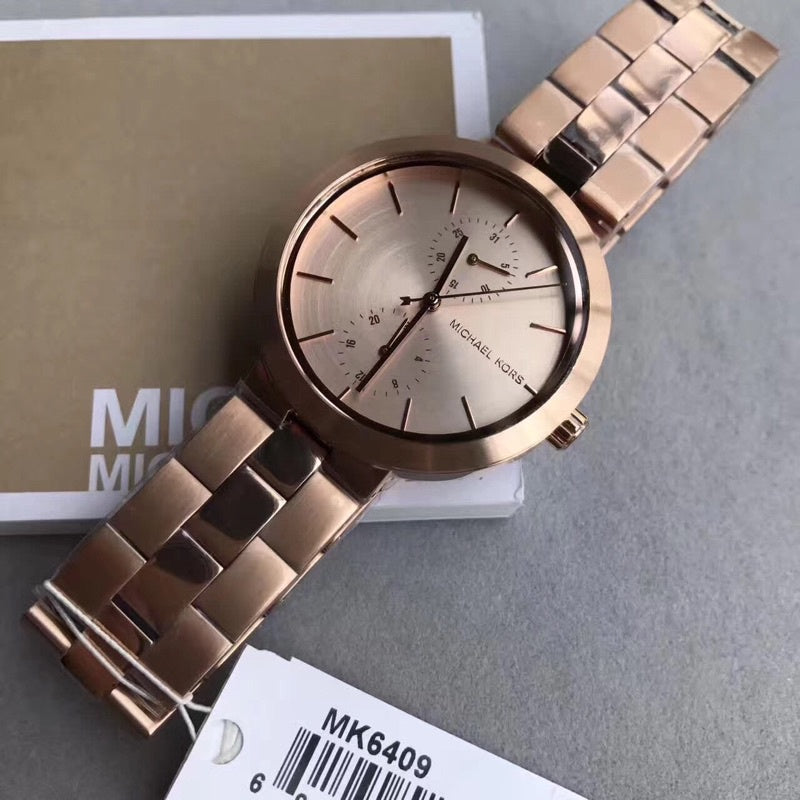  Shop Authentic Michael Kors Garner Quartz Rose Gold Dial Rose Gold Steel Strap Watch For Women - MK6409 - Luxxuri