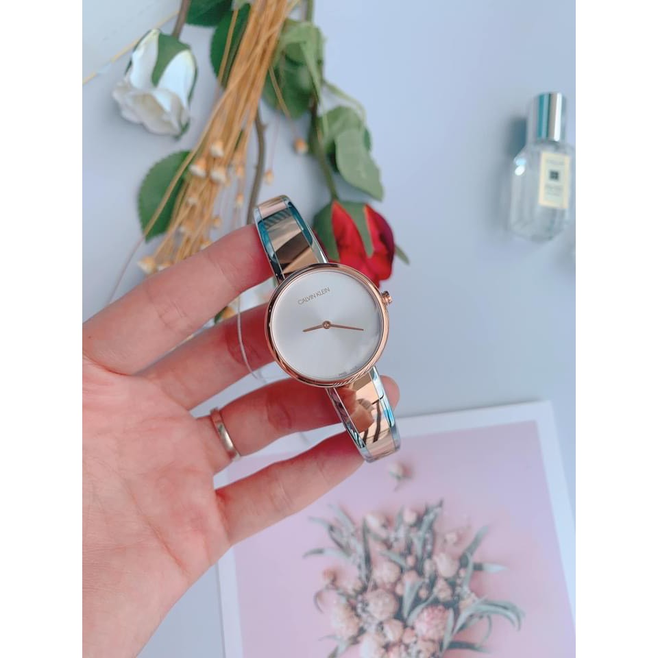  Shop Authentic Calvin Klein Seduce Silver Dial Two Tone Steel Strap Watch for Women - K4E2N61X - Luxxuri