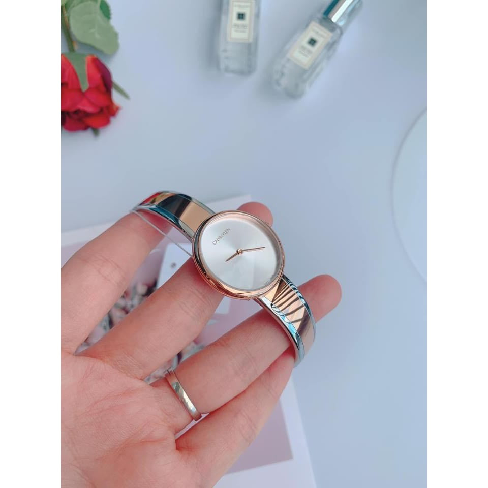  Shop Authentic Calvin Klein Seduce Silver Dial Two Tone Steel Strap Watch for Women - K4E2N61X - Luxxuri