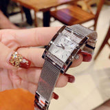  Shop Authentic Guess Nouveau Diamonds Silver Dial Silver Mesh Bracelet Watch for Women - W0127L1 - Luxxuri