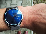 Shop Authentic Calvin Klein Minimal Blue Dial Silver Mesh Bracelet Watch for Men - K3M2112N - Luxxuri