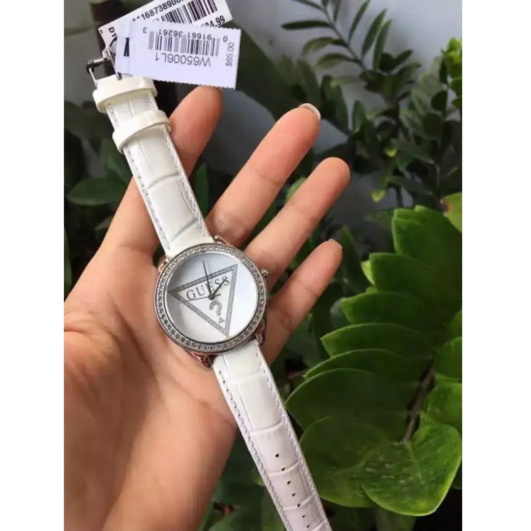 Shop Authentic Guess Mini Triangle Quartz Diamonds Silver Dial White Leather Strap Watch For Women - W65006L1 - Luxxuri
