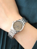  Shop Authentic Gucci G Timeless Brown Dial Silver Steel Strap Watch For Women - YA126526 - Luxxuri