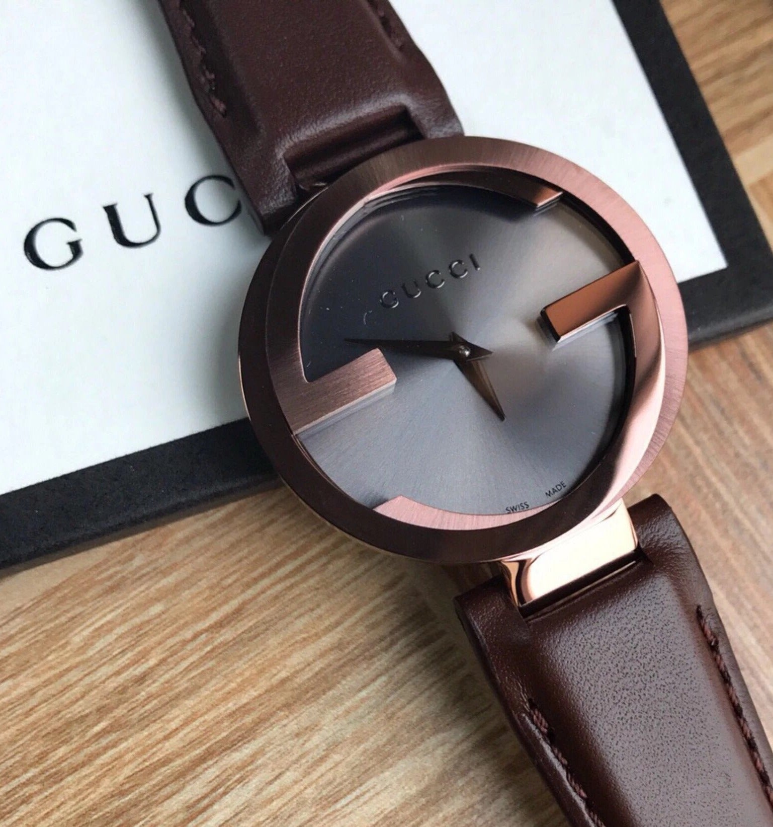  Shop Authentic Gucci Interlocking G 18K Gold Black Dial Brown Leather Strap Watch For Women - YA133304 - Luxxuri
