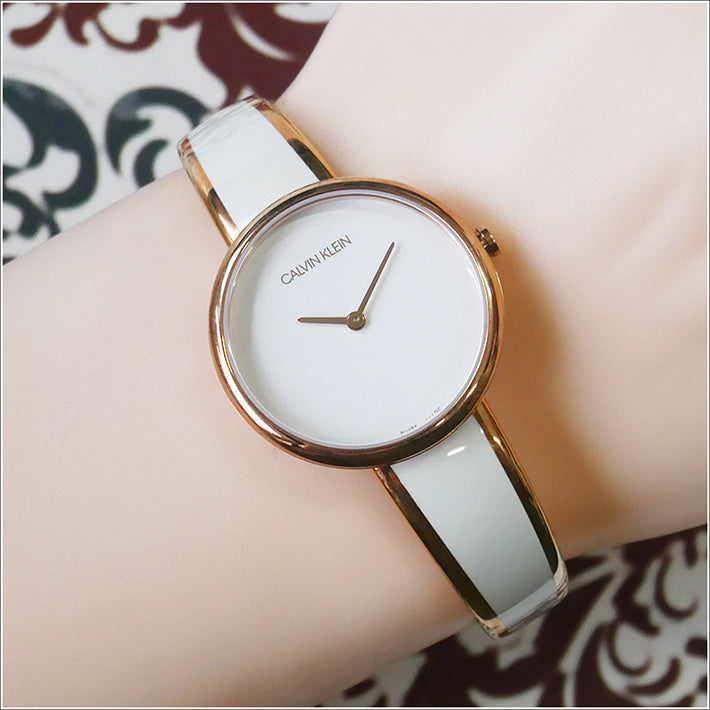  Shop Authentic Calvin Klein Seduce White Dial Two Tone Steel Strap Watch for Women - K4E2N616 - Luxxuri