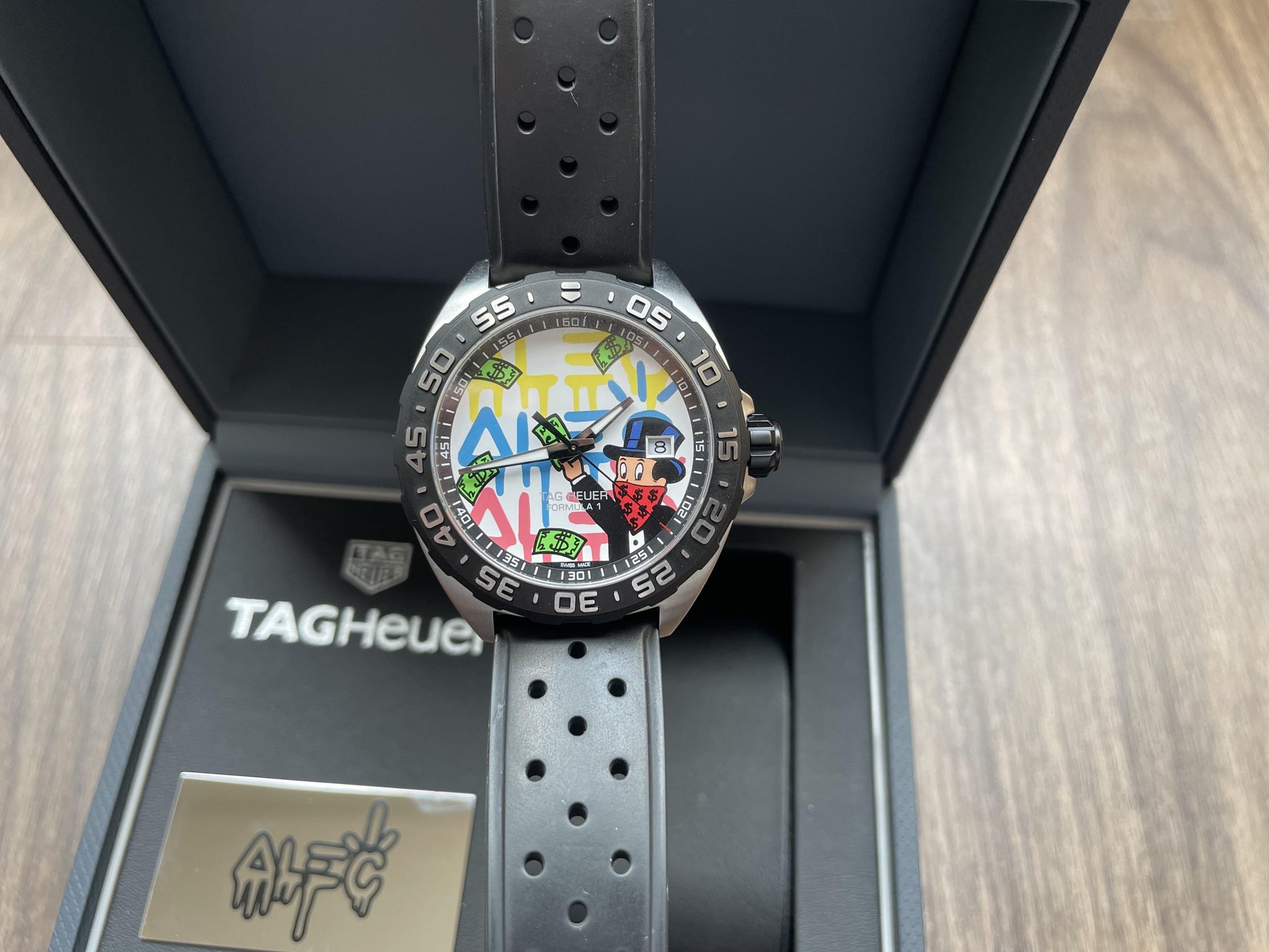  Shop Authentic Tag Heuer Formula 1 Alec Monopoly White Dial Watch for Men - WAZ1119.FT8023 - Luxxuri