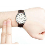  Shop Authentic Guess Wafer Quartz White Dial Brown Leather Strap Watch For Men - W70016G2 - Luxxuri