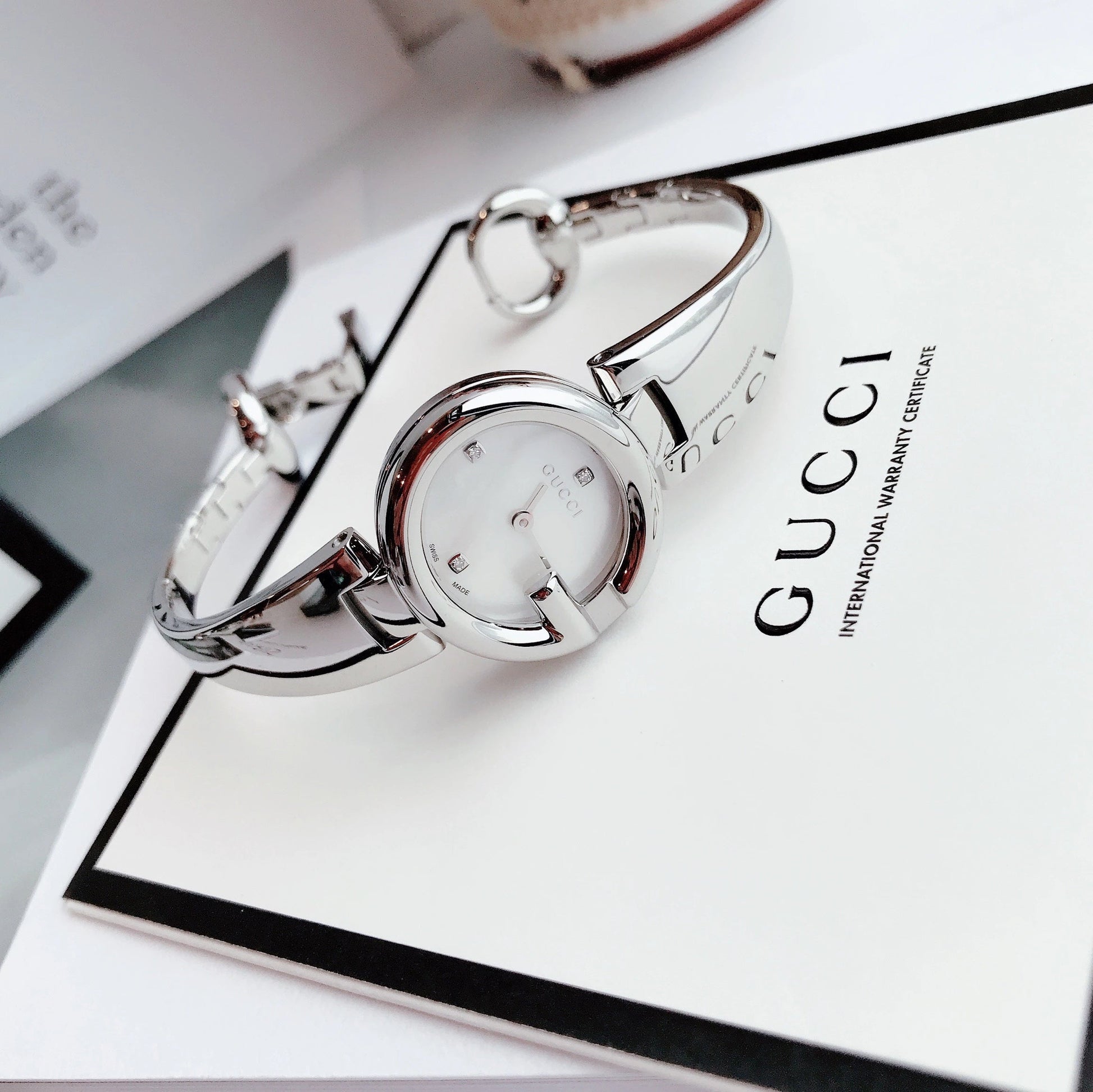  Shop Authentic Gucci Guccissima Diamonds Mother of Pearl Dial Silver Steel Strap Watch For Women - YA134504 - Luxxuri