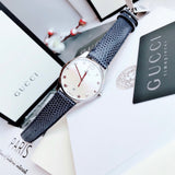  Shop Authentic Gucci G-Timeless Signature Mother of Pearl Silver Dial Blue Leather Strap Watch For Women - YA1264049 - Luxxuri