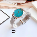  Shop Authentic Gucci G-Timeless Turquoise Mother of Pearl Dial Silver Mesh Bracelet Watch For Women - YA126582 - Luxxuri
