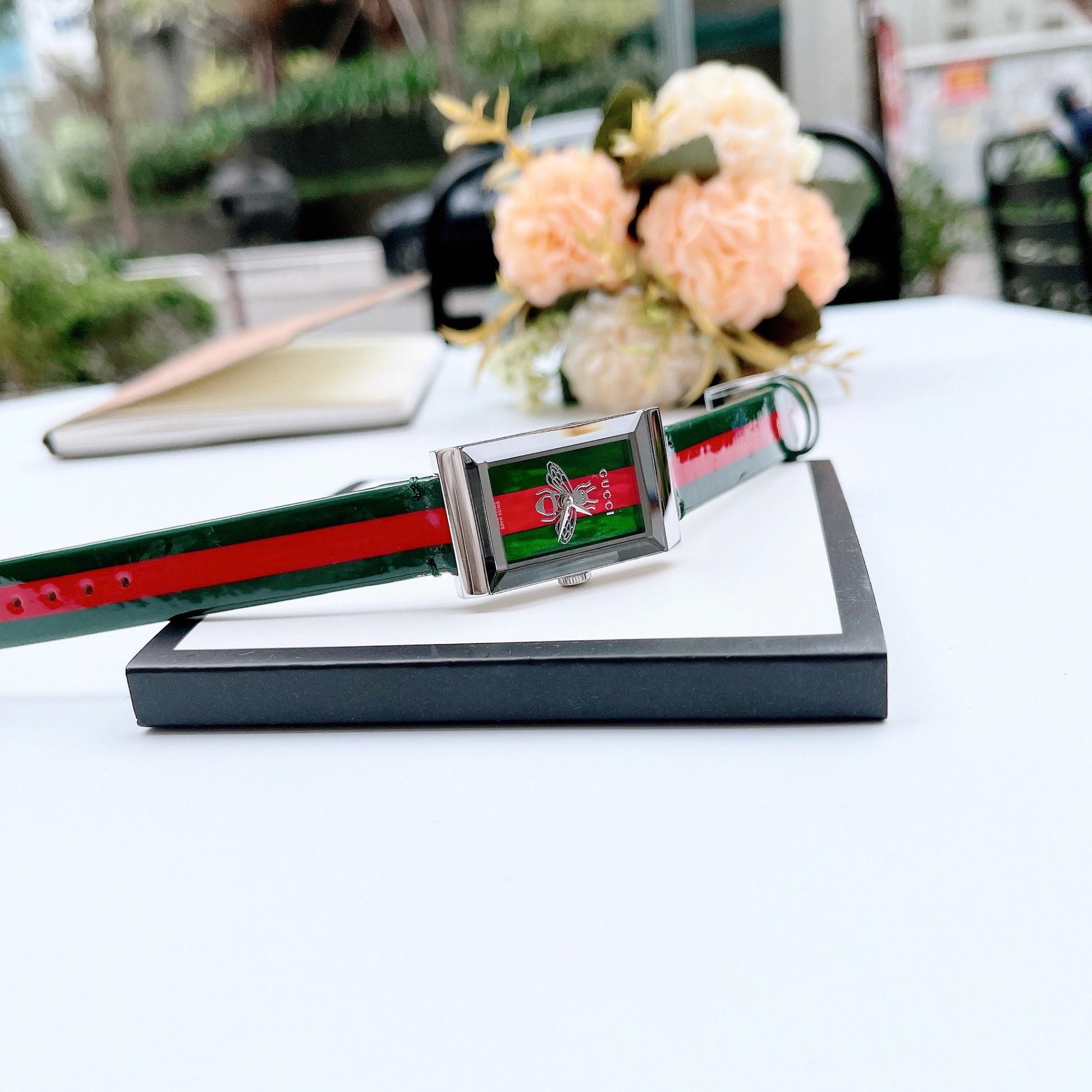  Shop Authentic Gucci G Frame Quartz Green & Red Mother of Pearl Dial Multicolor Leather Strap Watch For Women - YA147408 - Luxxuri