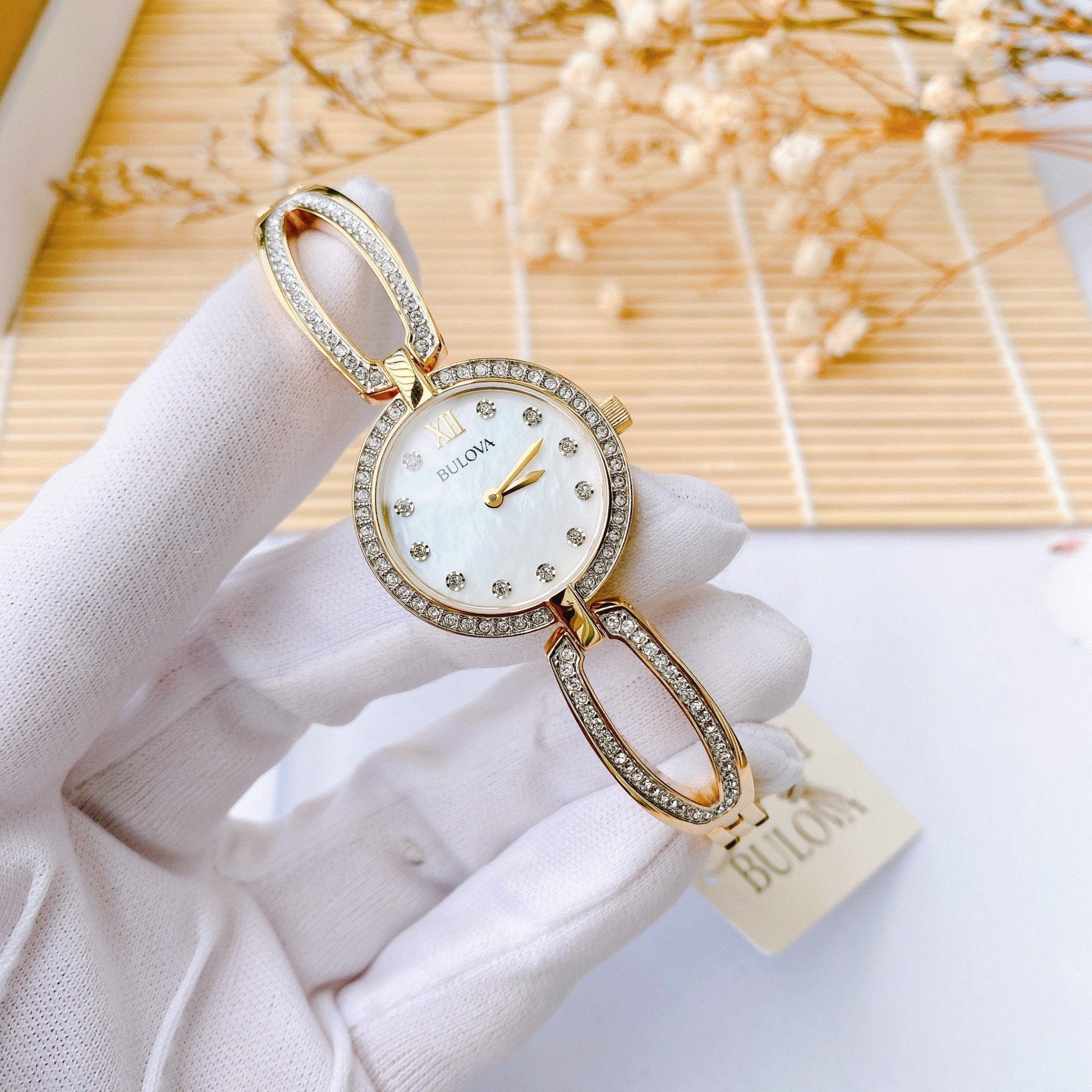  Shop Authentic Bulova Crystal Collection Mother of Pearl Dial Gold Steel Strap Watch for Women - 98L225 - Luxxuri