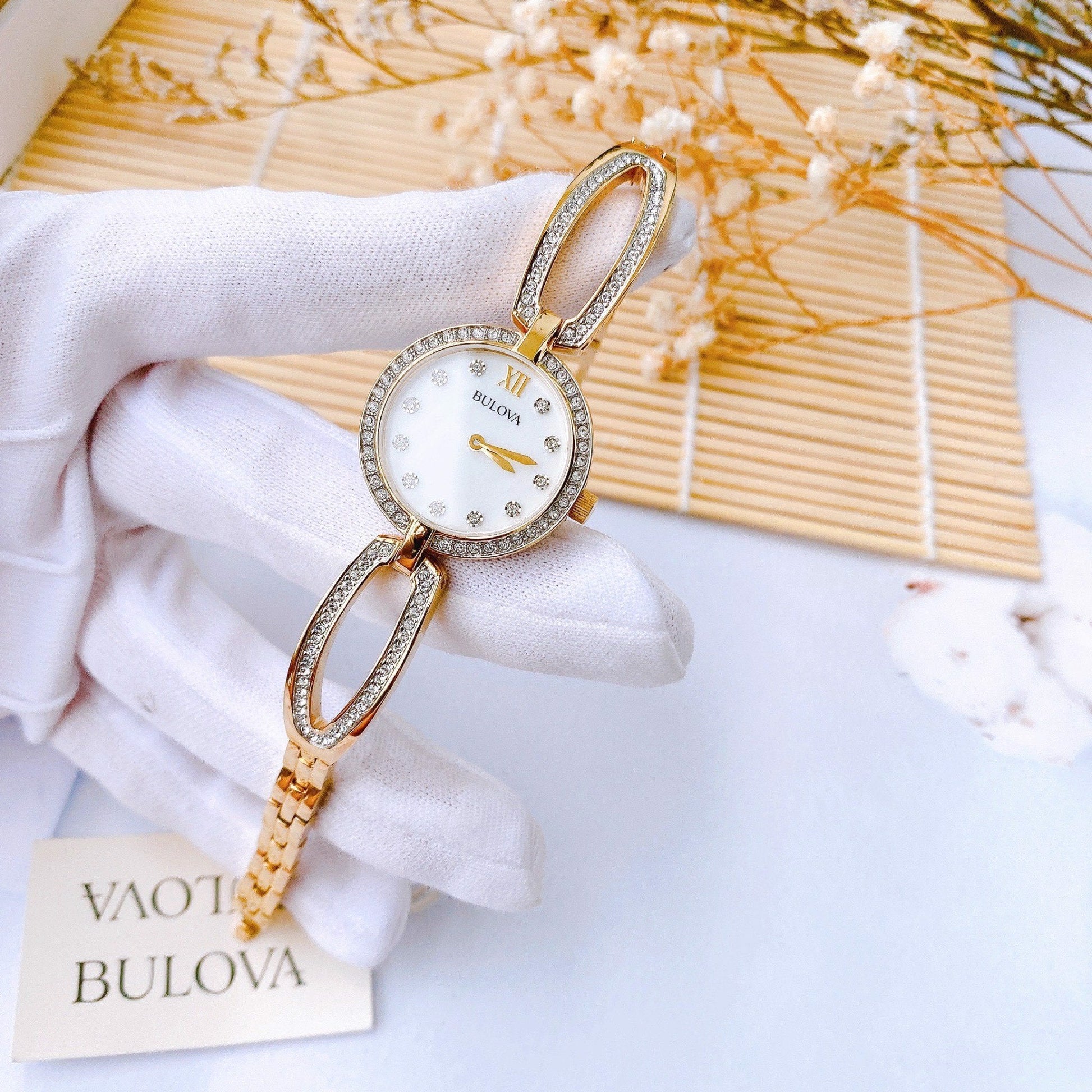  Shop Authentic Bulova Crystal Collection Mother of Pearl Dial Gold Steel Strap Watch for Women - 98L225 - Luxxuri