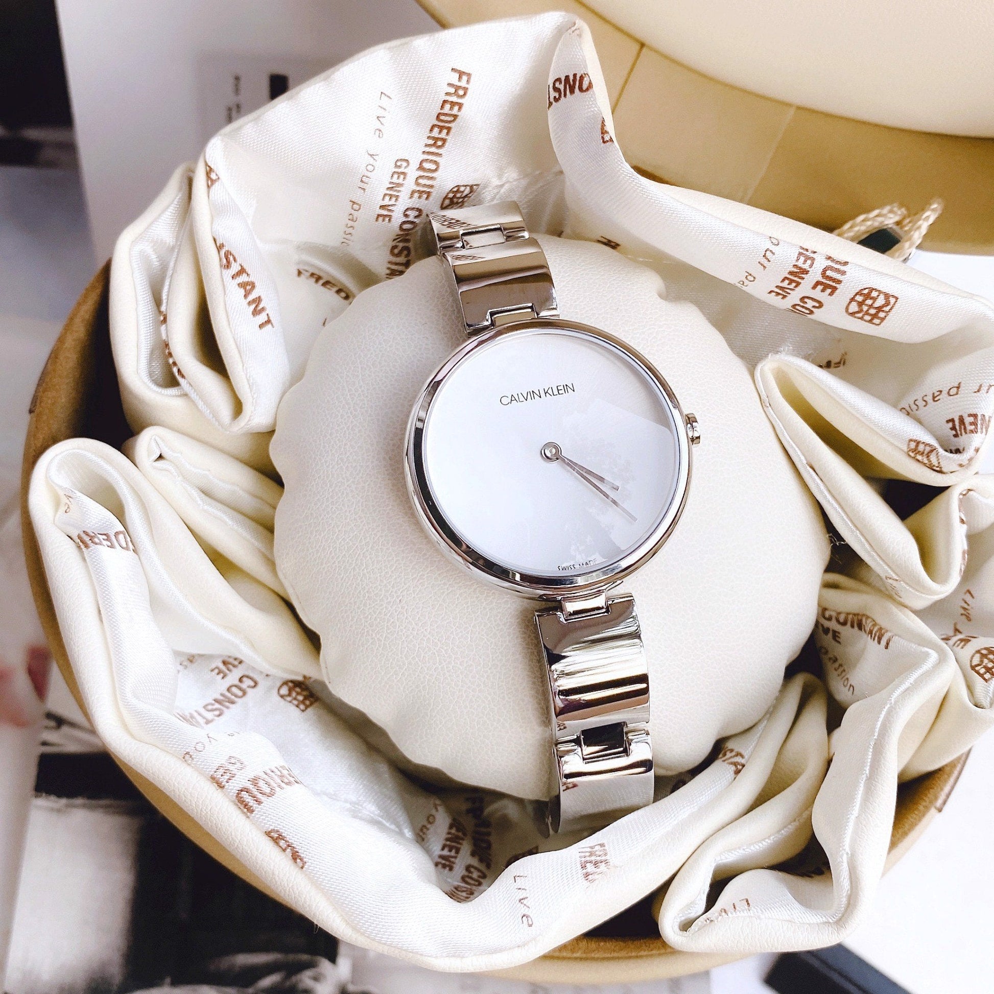  Shop Authentic Calvin Klein Wavy Silver Dial Silver Steel Strap Watch for Women - K9U23146 - Luxxuri