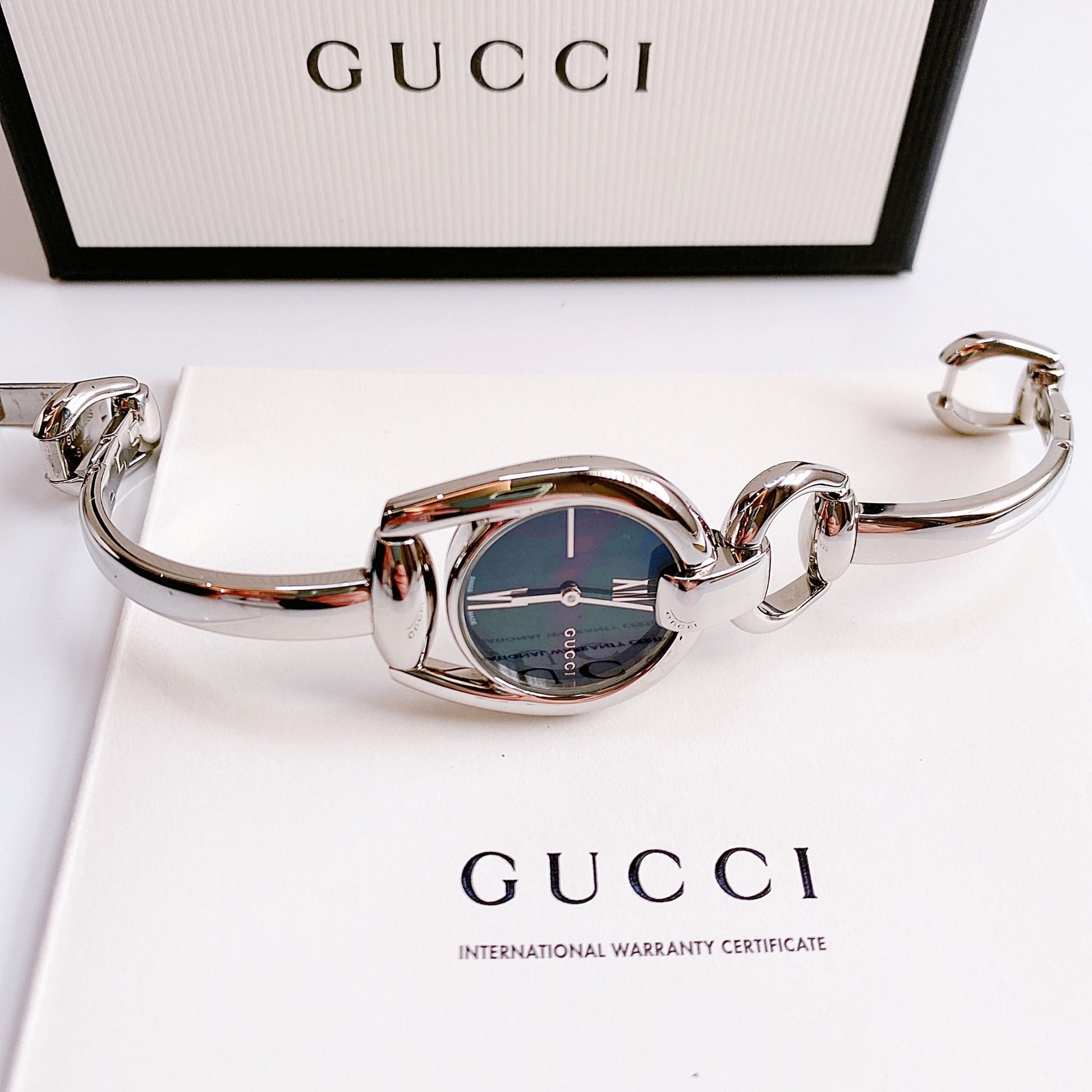  Shop Authentic Gucci Horsebit Collection Mother of Pearl Black Dial Silver Steel Strap Watch For Women - YA139503 - Luxxuri