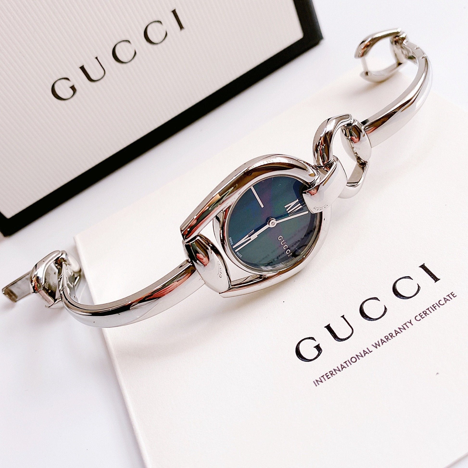  Shop Authentic Gucci Horsebit Collection Mother of Pearl Black Dial Silver Steel Strap Watch For Women - YA139503 - Luxxuri