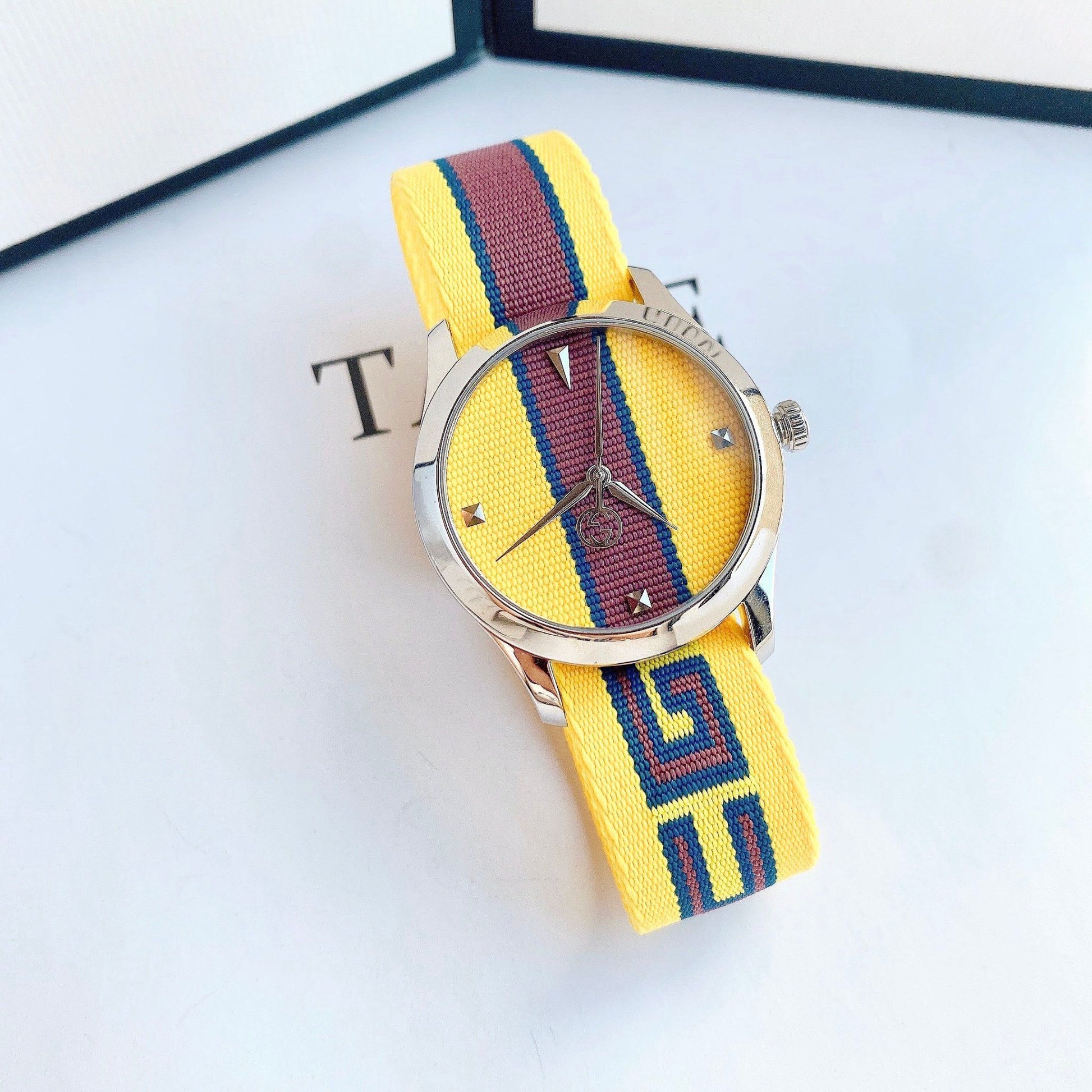  Shop Authentic Gucci G Timeless Quartz Yellow & Purple Dial Yellow & Purple NATO Strap Watch For Men - YA1264069 - Luxxuri