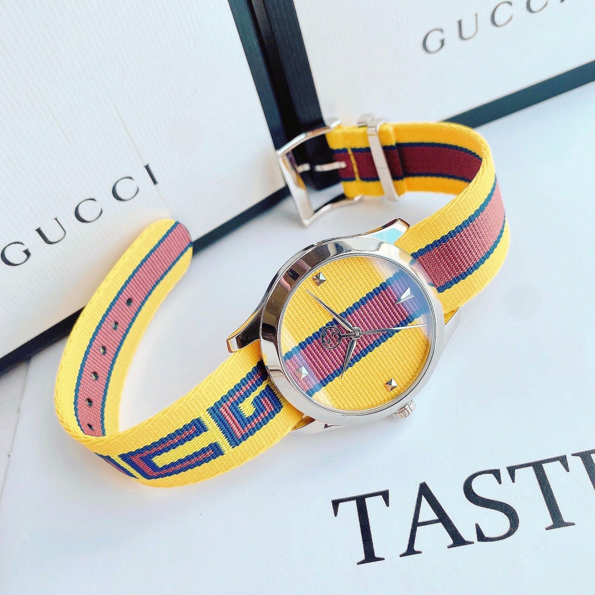  Shop Authentic Gucci G Timeless Quartz Yellow & Purple Dial Yellow & Purple NATO Strap Watch For Men - YA1264069 - Luxxuri