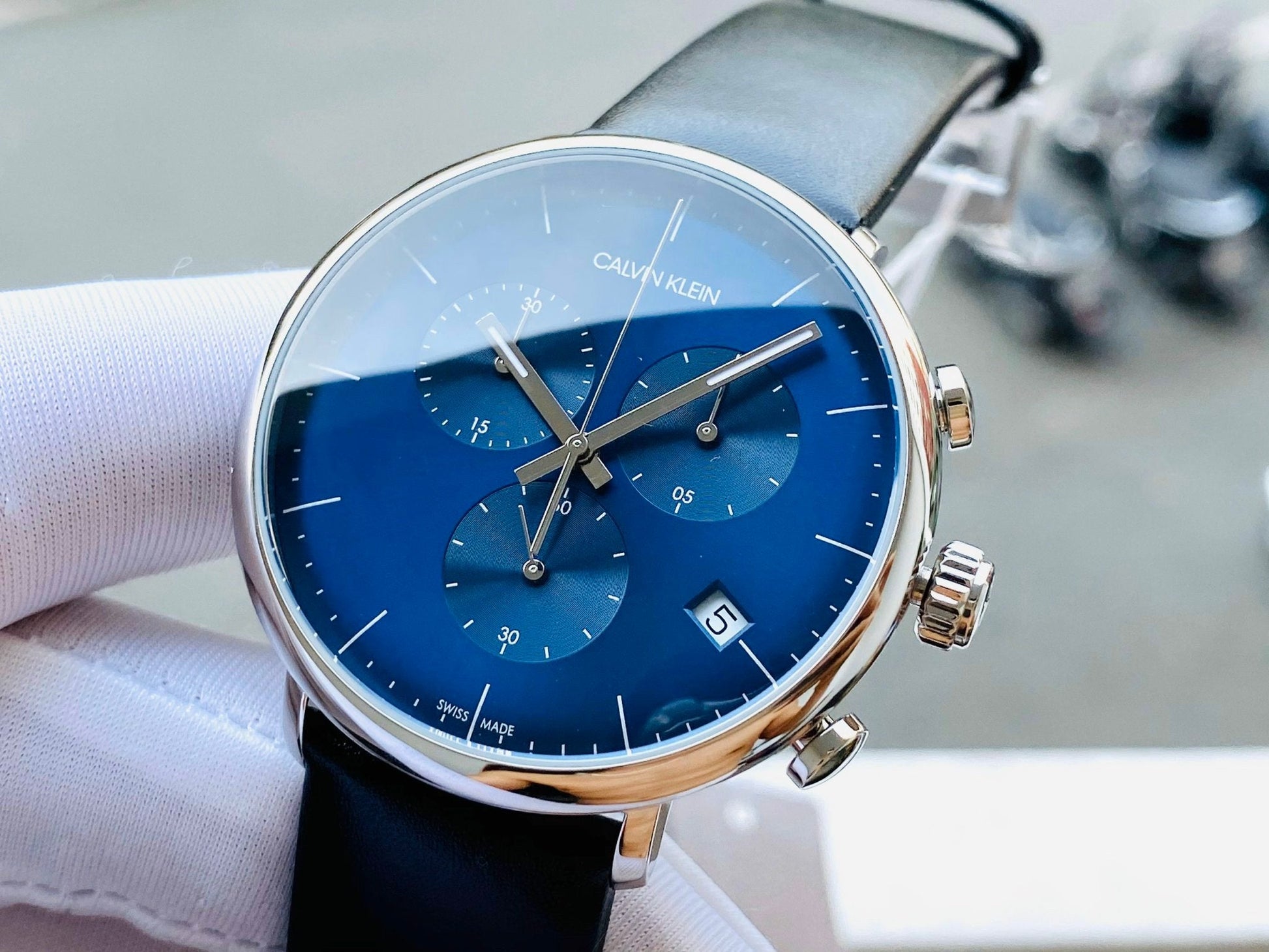  Shop Authentic Calvin Klein High Noon Chronograph Blue Dial Black Leather Strap Watch for Men - K8M271CN - Luxxuri