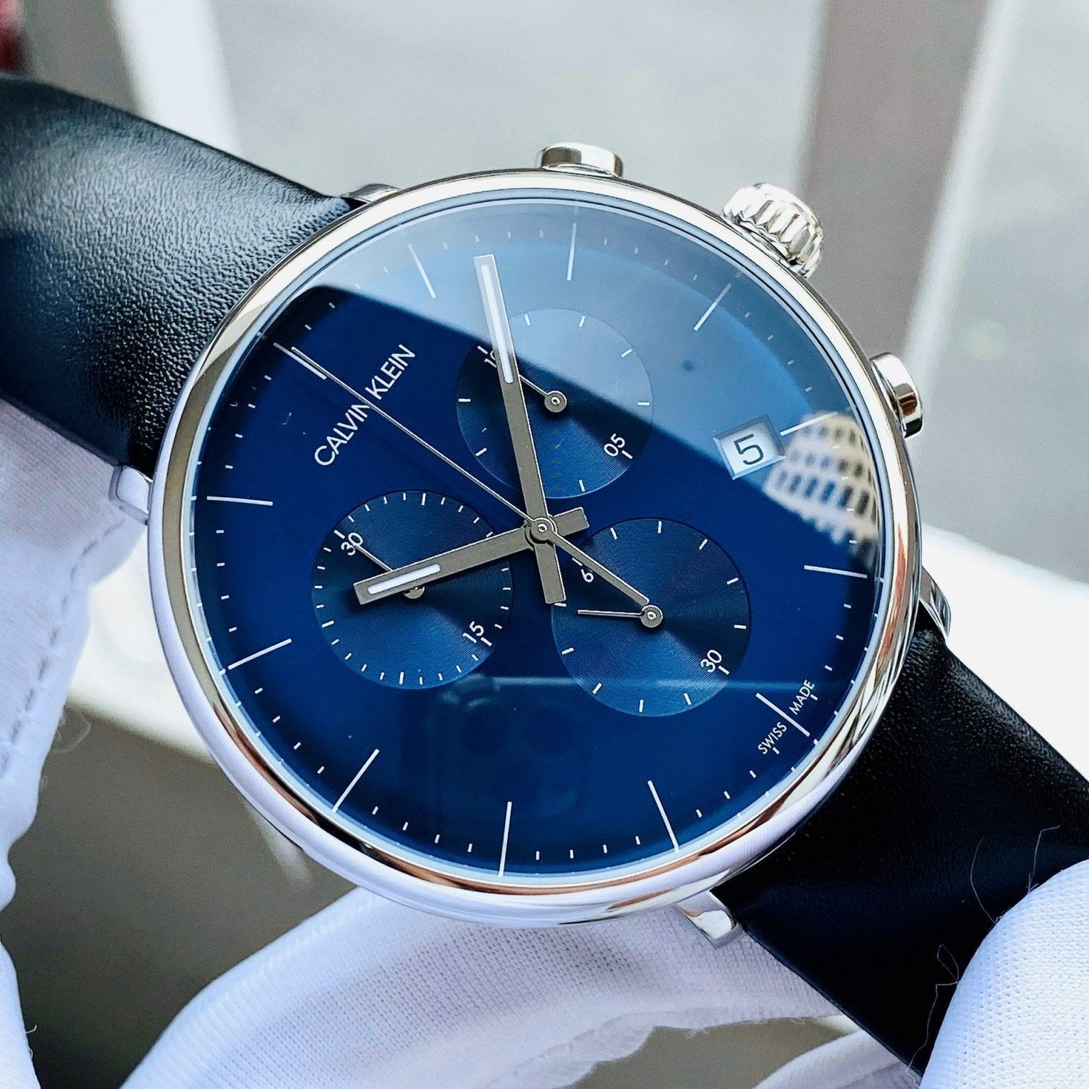  Shop Authentic Calvin Klein High Noon Chronograph Blue Dial Black Leather Strap Watch for Men - K8M271CN - Luxxuri