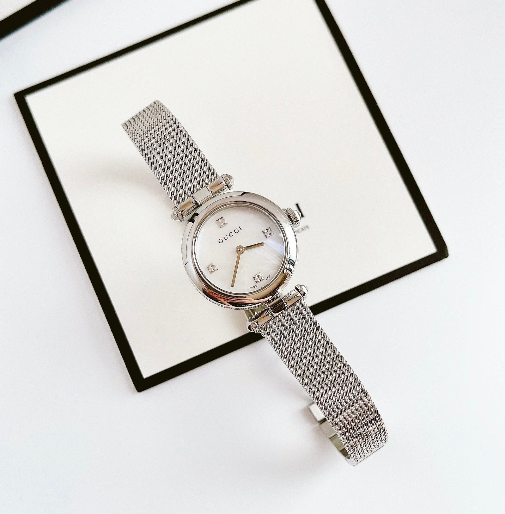  Shop Authentic Gucci Diamantissima Quartz Diamonds Mother of Pearl Dial Silver Mesh Bracelet Watch for Women - YA141504 - Luxxuri