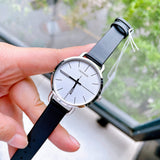  Shop Authentic Calvin Klein Evan White Dial Black Leather Strap Watch for Women - K7B231CY - Luxxuri
